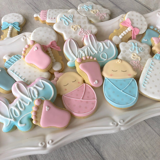 royal iced pink and blue baby shaped biscuits