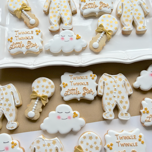 white and gold iced biscuits for twinkle little start theme baby shower