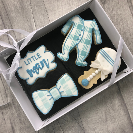 white and blue royal iced biscuits for a baby boy gift