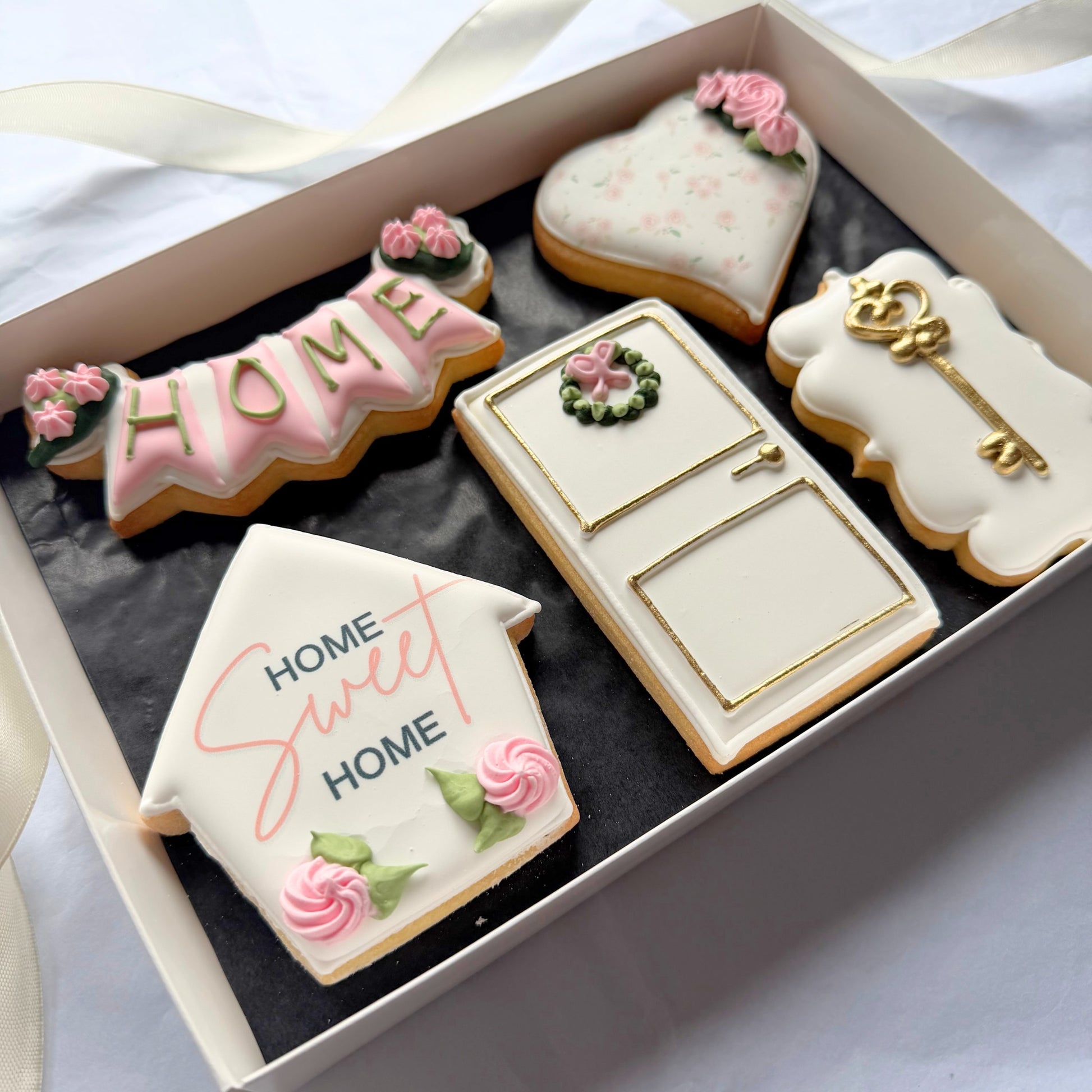 Handmade housewarming biscuits with gold key