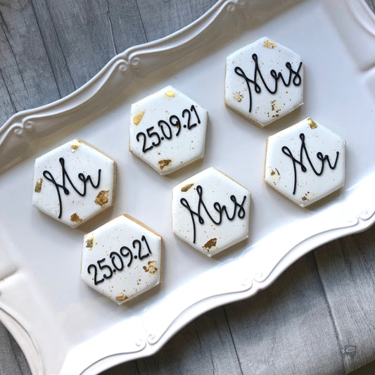 Iced wedding biscuit favours in white with black Mr and Mrs