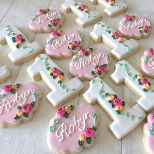 hand iced biscuits in number 1 shape with flower details