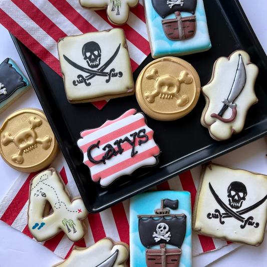 hand iced biscuits in pirate theme shapes for pirate birthday party 
